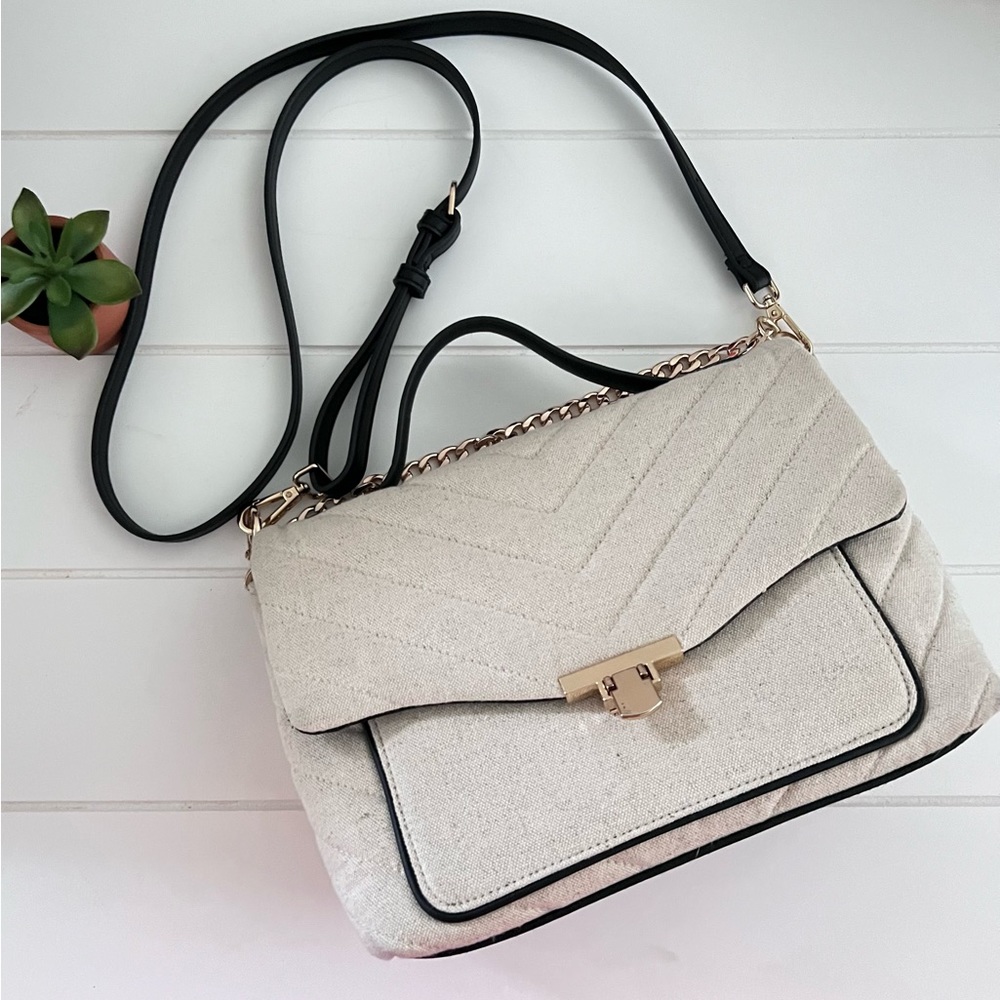 Quilted cream and black handbag